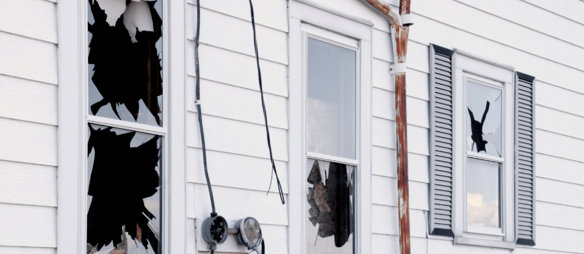 Damaged area inside a home shown in a guide to property damage and repairs.