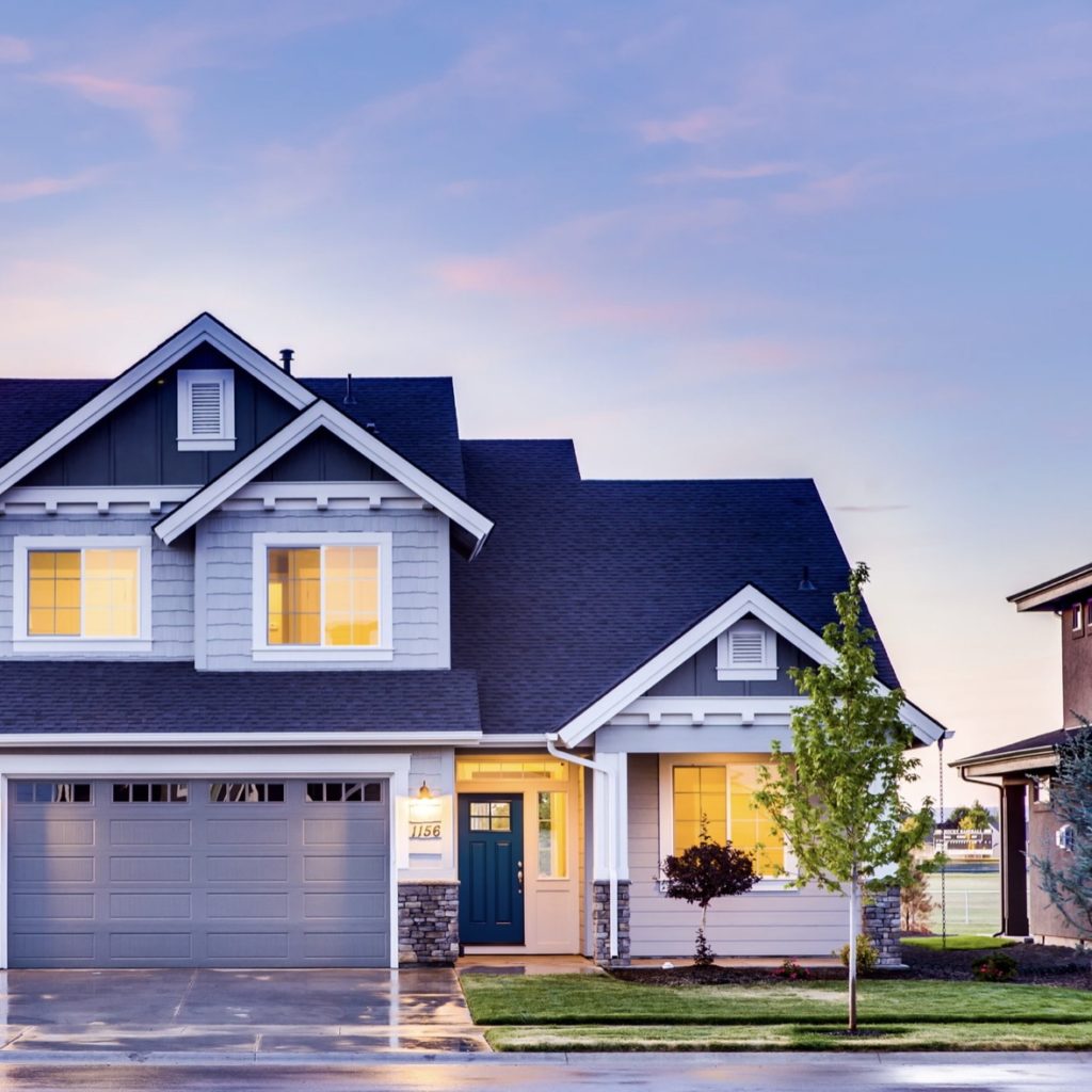 Residential home exterior illustrating a personal property insurance claim.