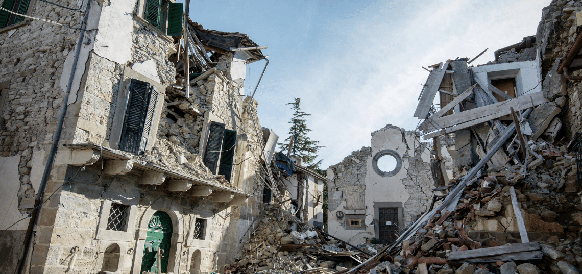 Damaged building featured in Property Claims Consultant’s earthquake insurance guidance.